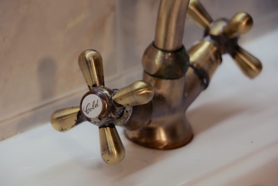 Antique brass faucet plumbing fixture installation