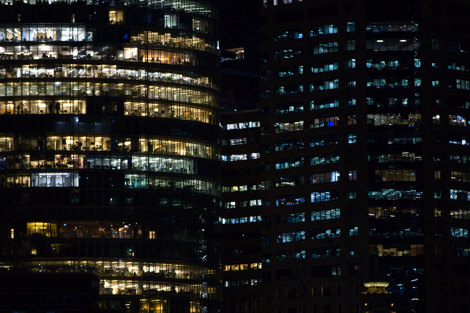 Modern office buildings illuminated at night in Sydney