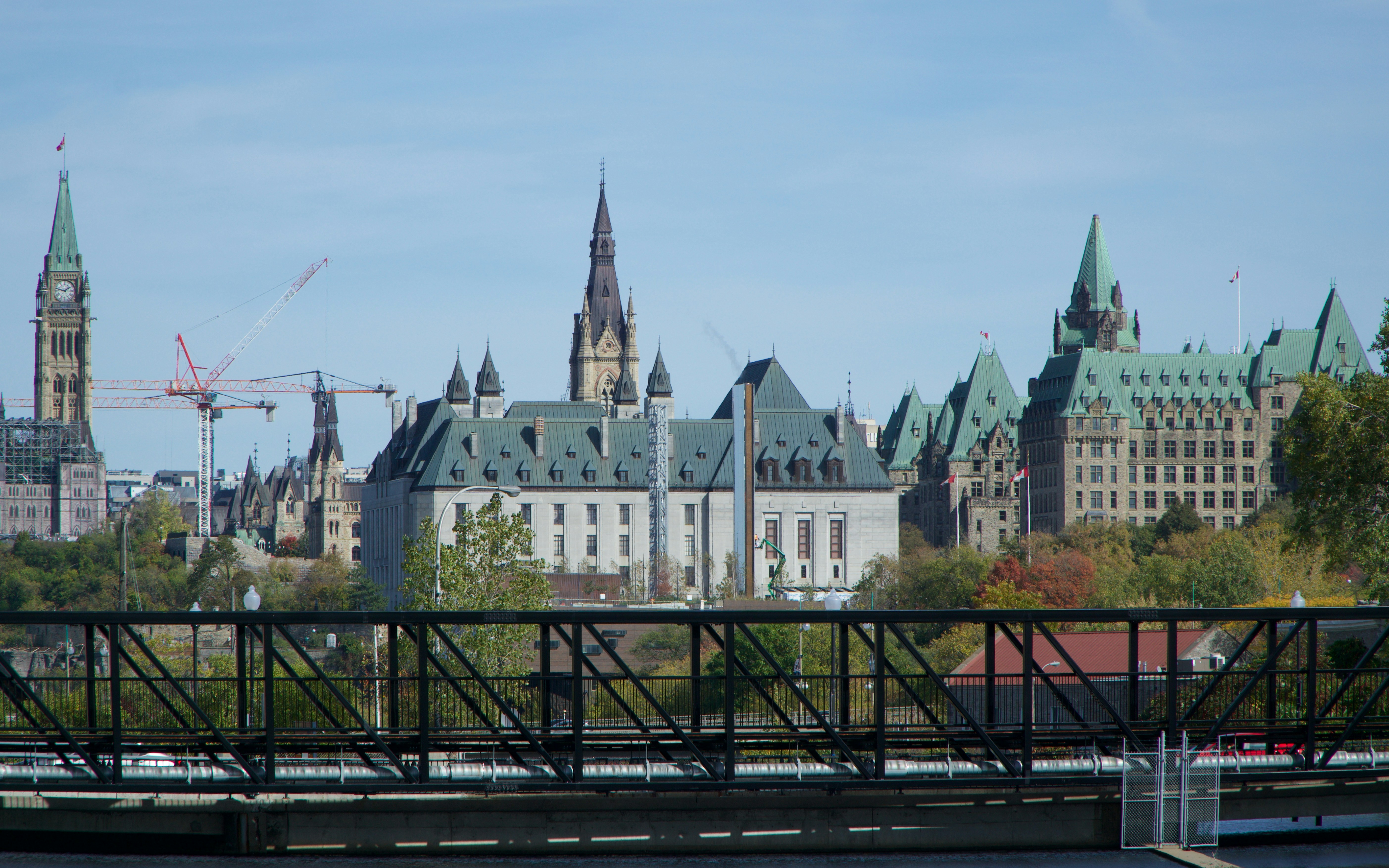 Grand historic buildings under a clear blue sky.