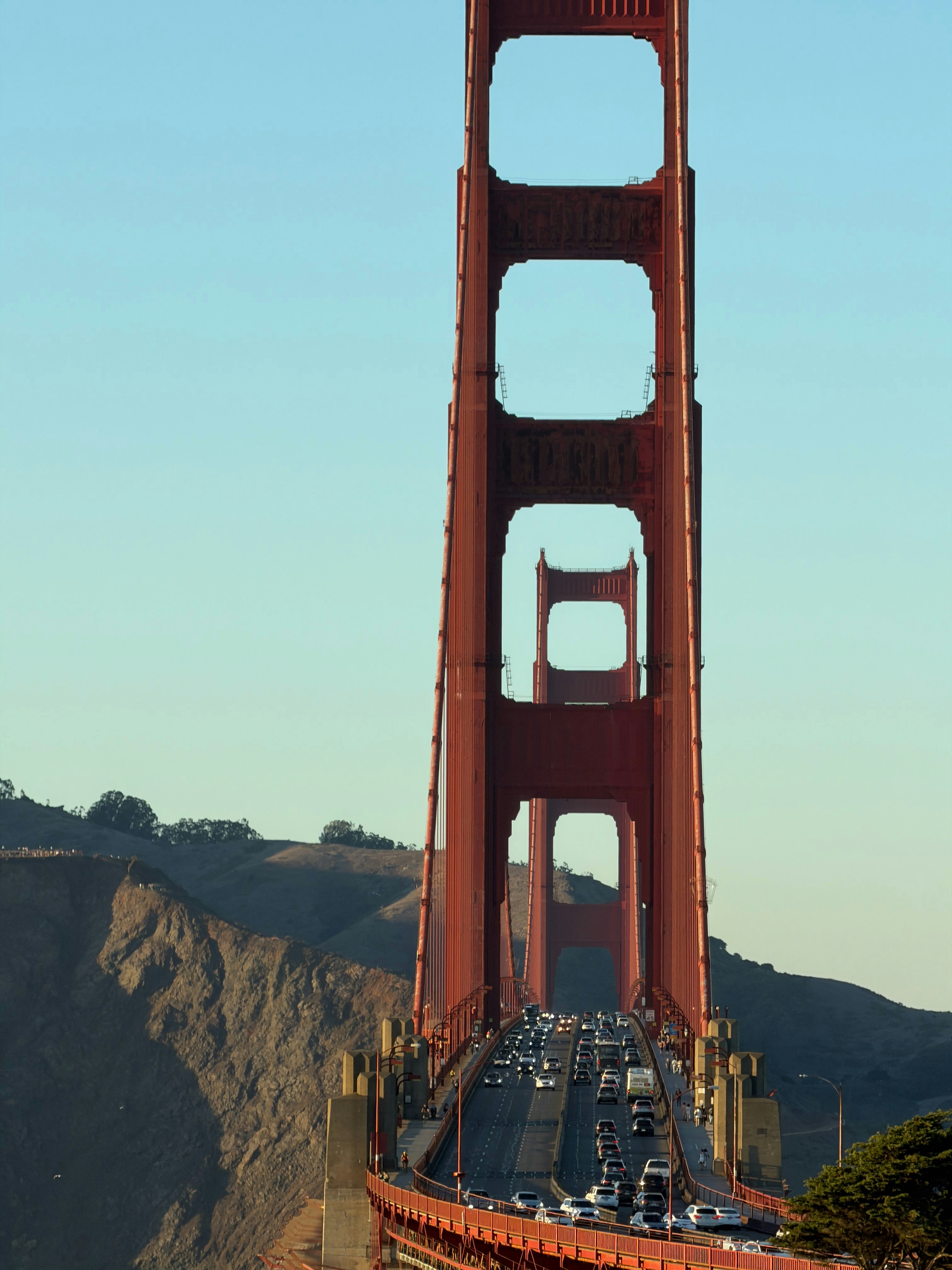 Golden gate bridge with traffic under clear sky