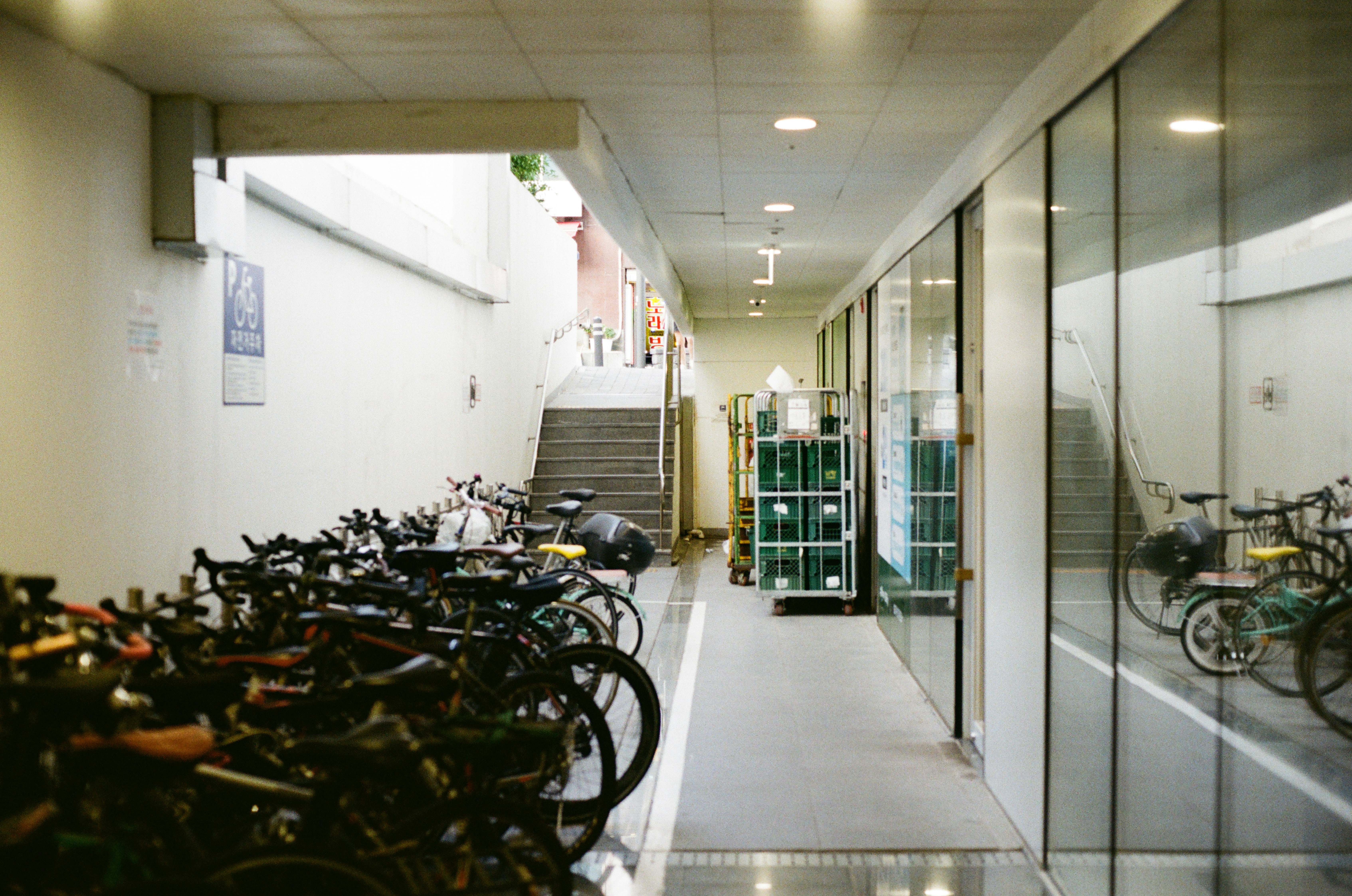 Secure indoor bike parking facility with racks and a repair station - bike to work incentives