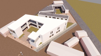 Modern architectural design of a white building complex.