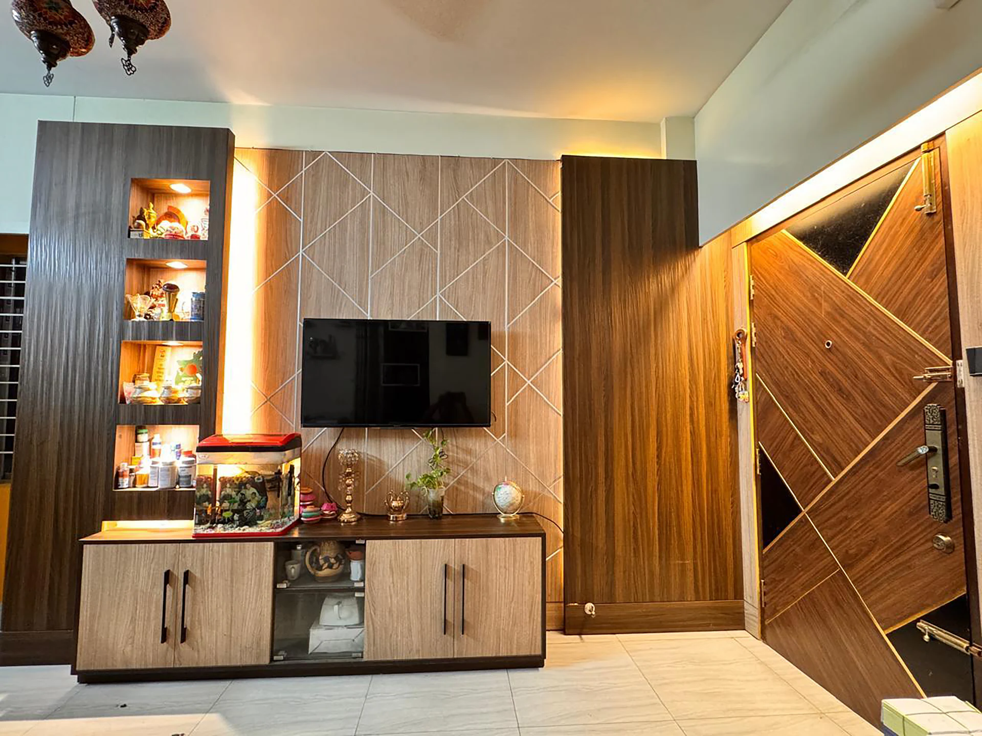 TV wall with display niches and concealed storage