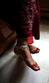 Woman's feet with henna and anklet