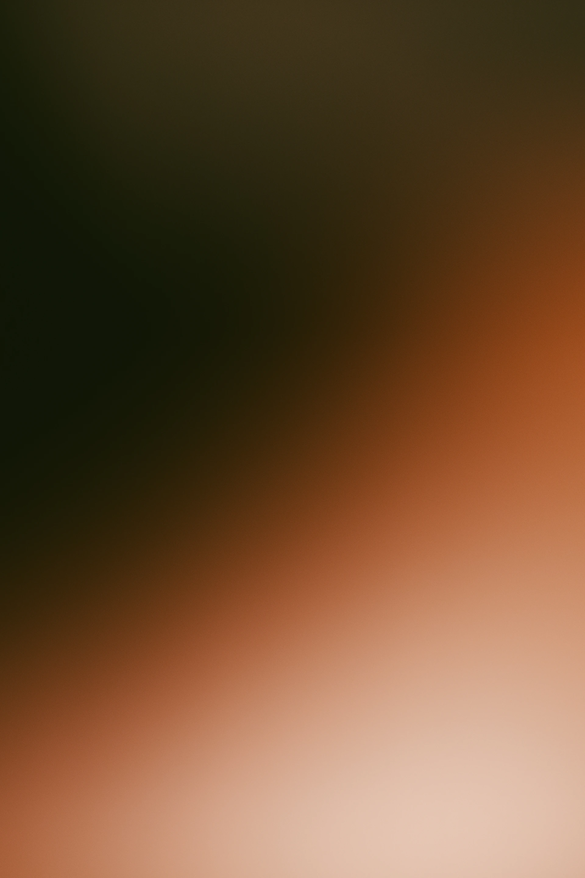 A gradient of dark green to light orange.