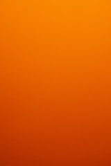 A smooth gradient of orange to dark orange.