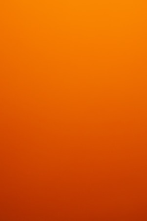 A smooth gradient of orange to dark orange.