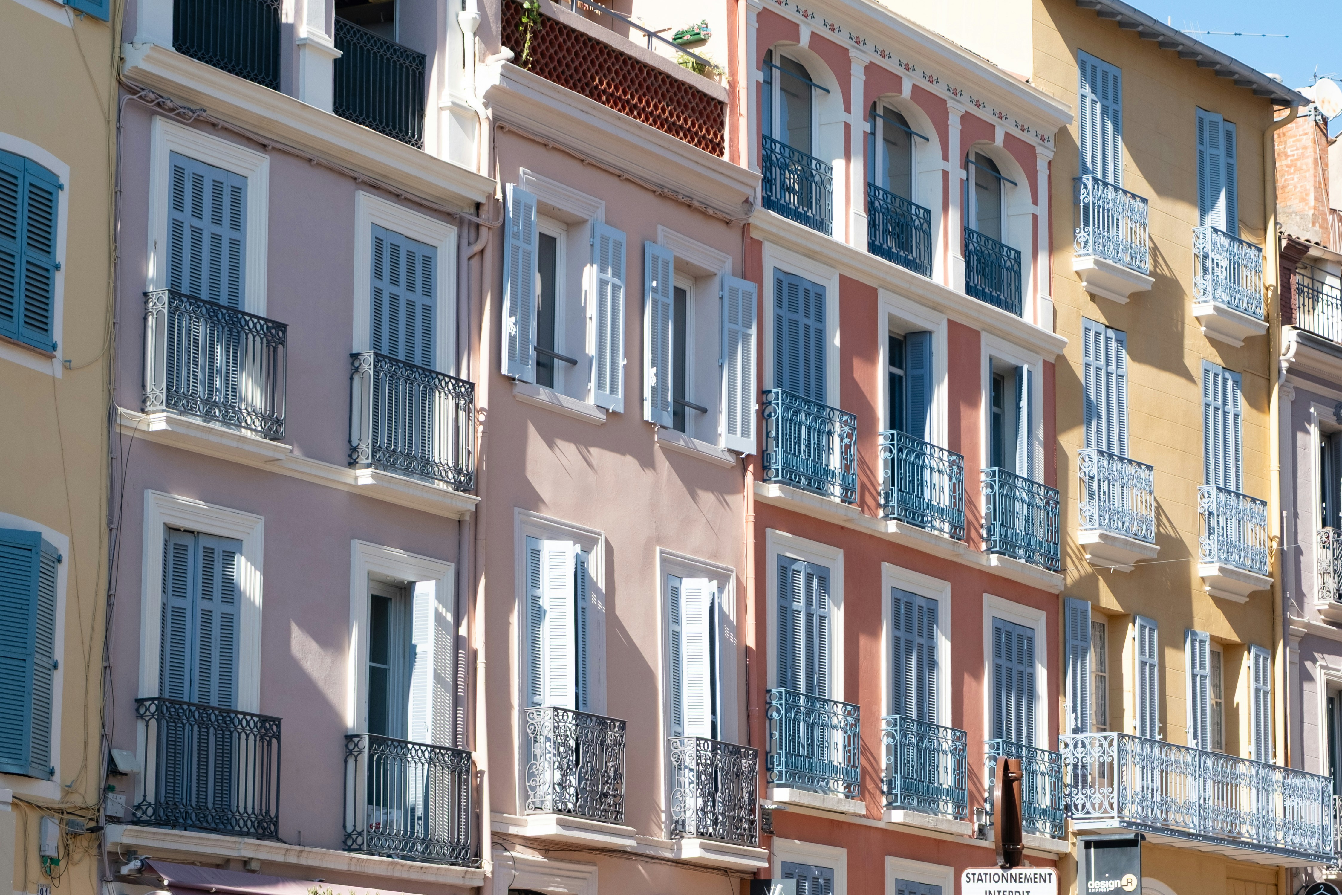Colorful buildings with balconies and shutters