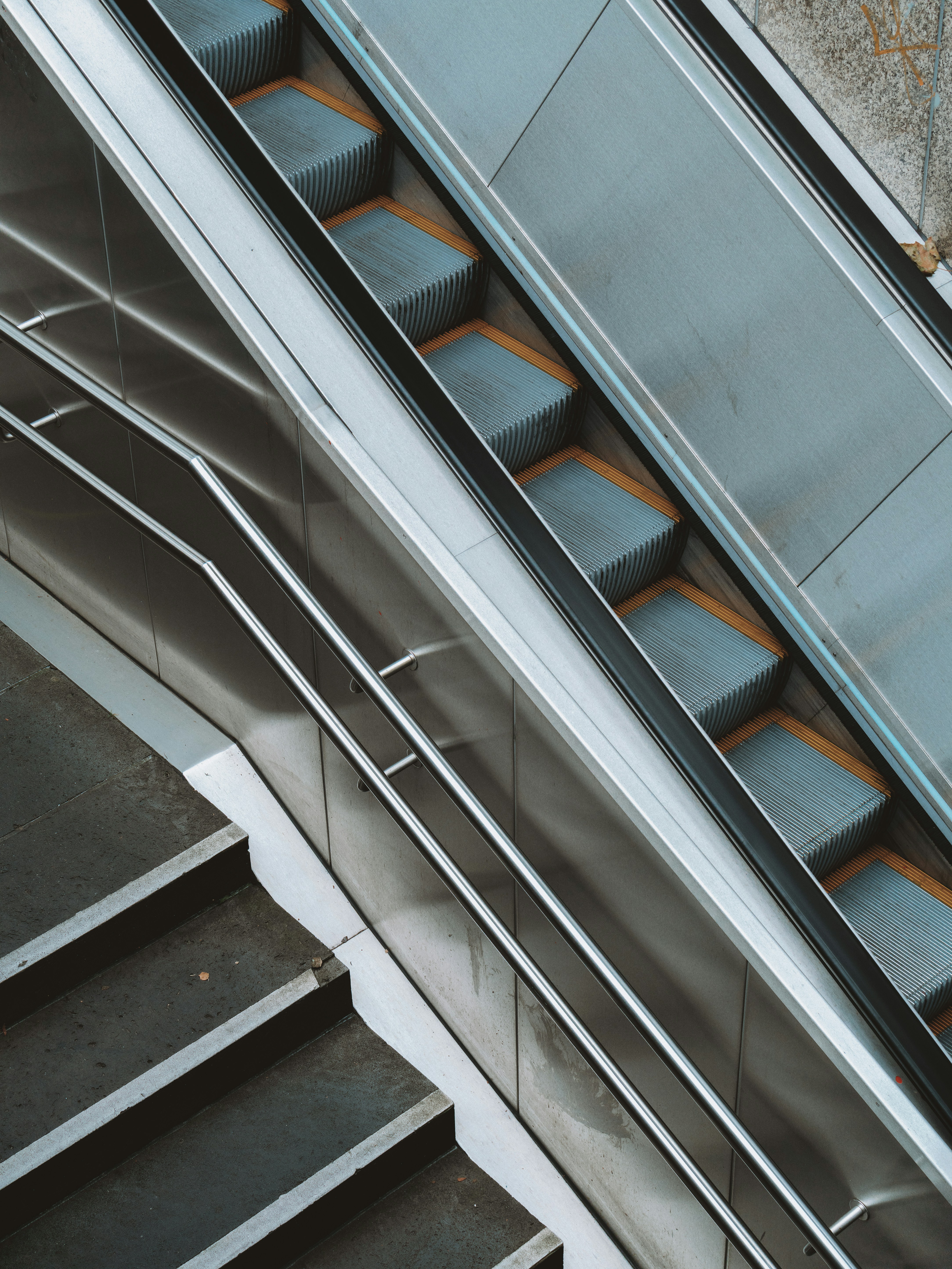 Modern escalator and stairs in a building
