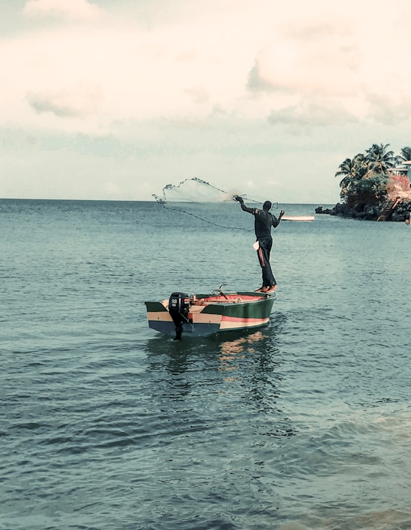 Captain and guests on a boat in the Caribbean
