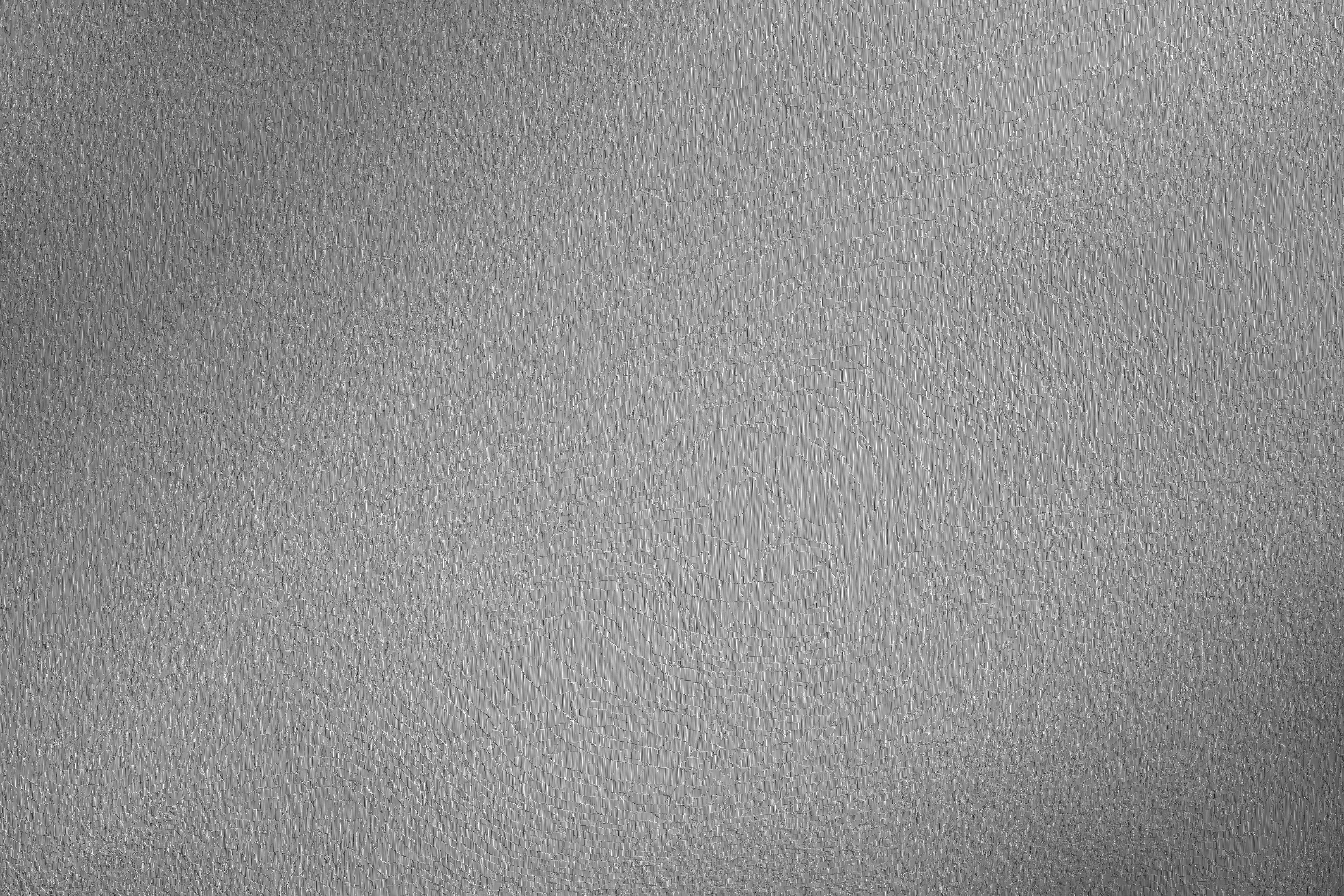 A textured gray background with subtle lighting