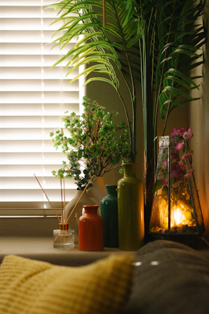 Decorative vases and plants on a windowsill