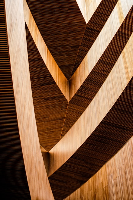 Abstract wooden geometric pattern with warm lighting