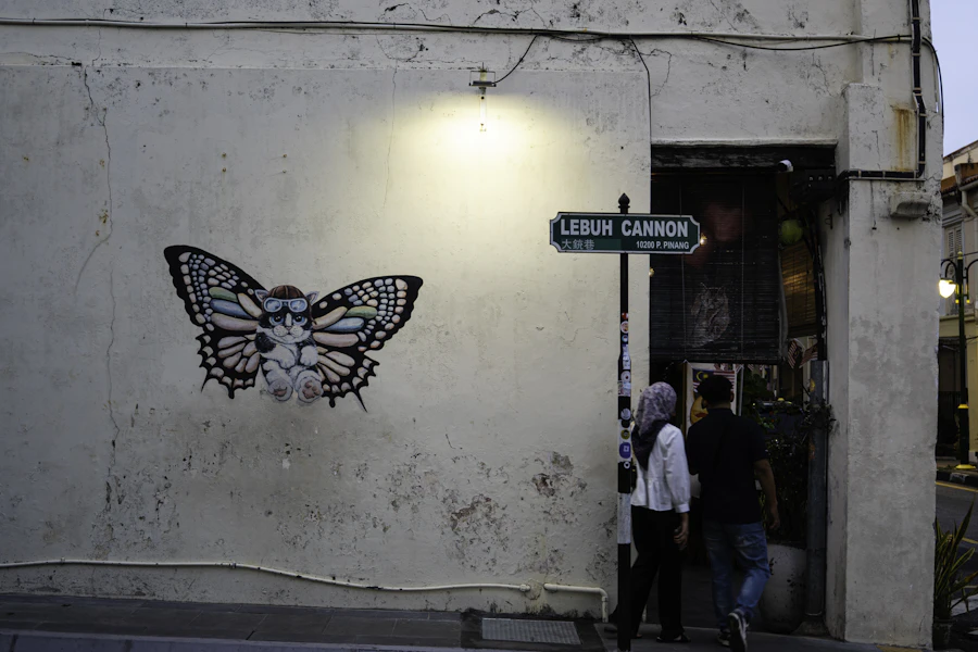 Colorful street art mural on a shophouse wall in George Town Penang
