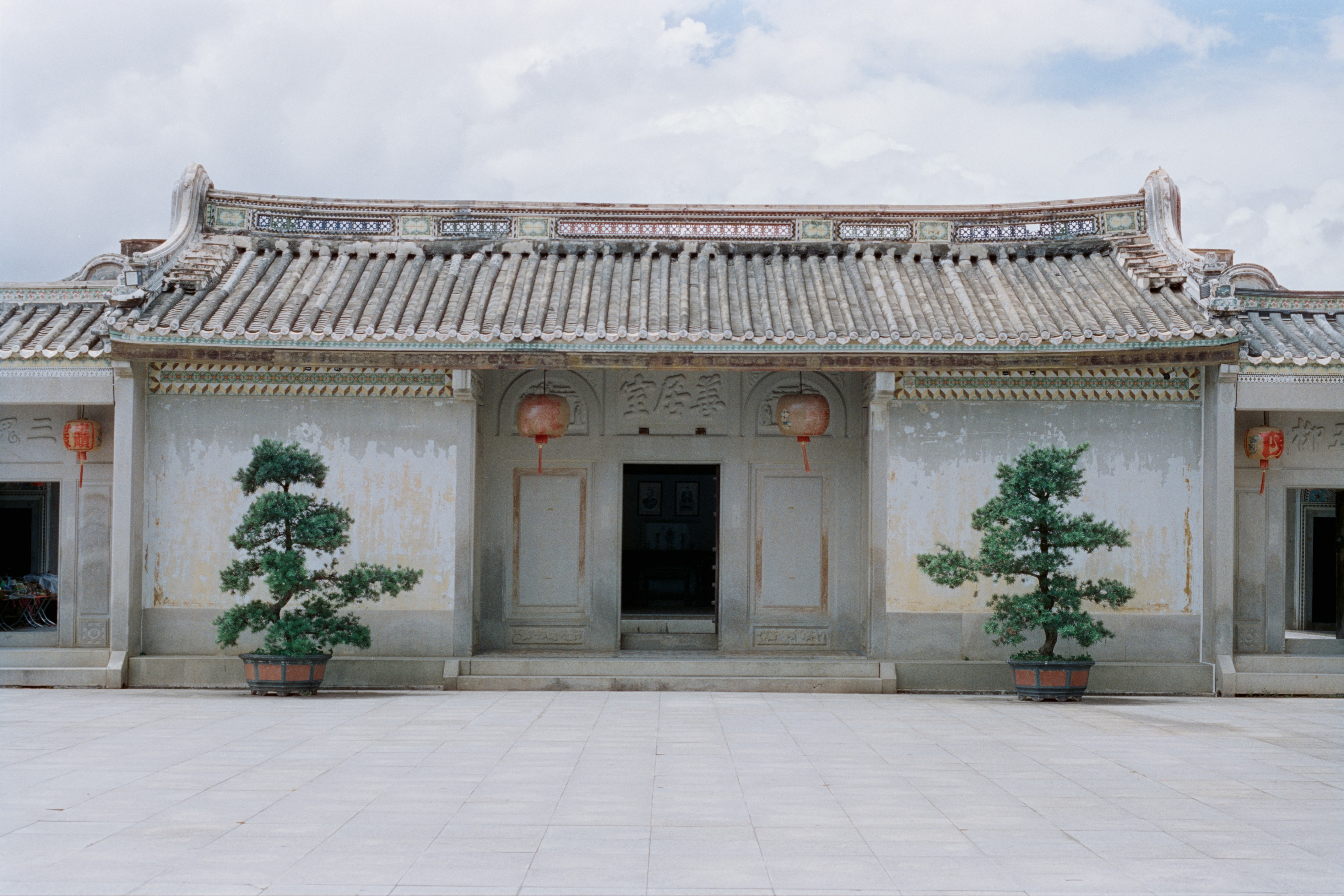 Traditional chinese courtyard house with potted trees