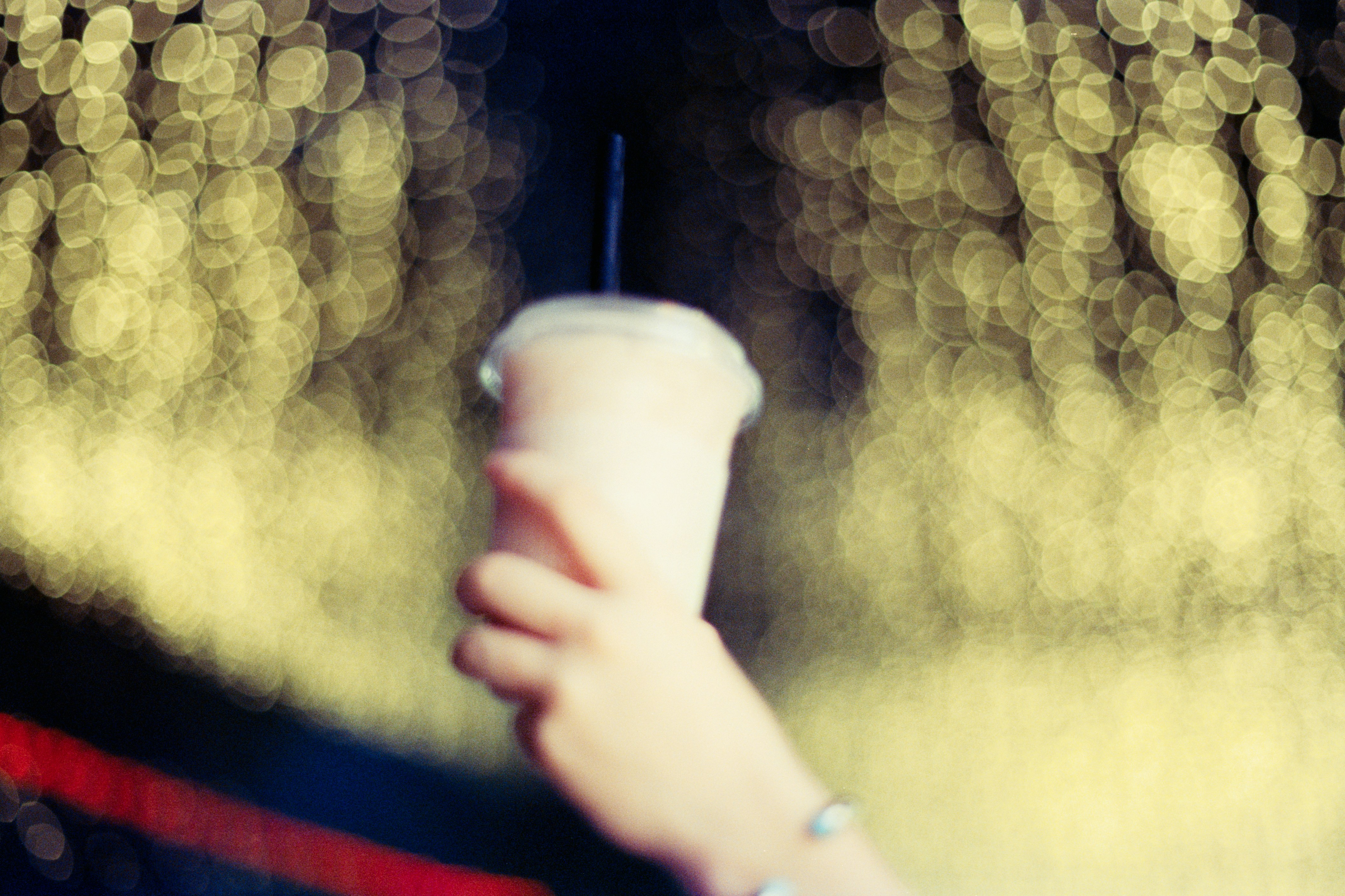 celebratory drinks party bokeh, ilustrasi artikel Open Bar: Toasting the Pros and Cons of a Freely Flowing Event 1