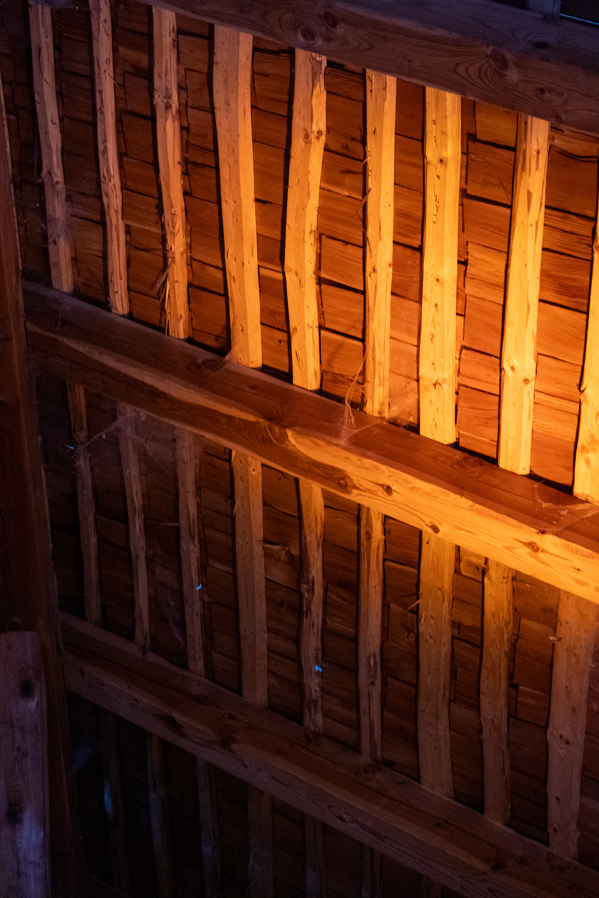 Wooden beams and planks of a ceiling
