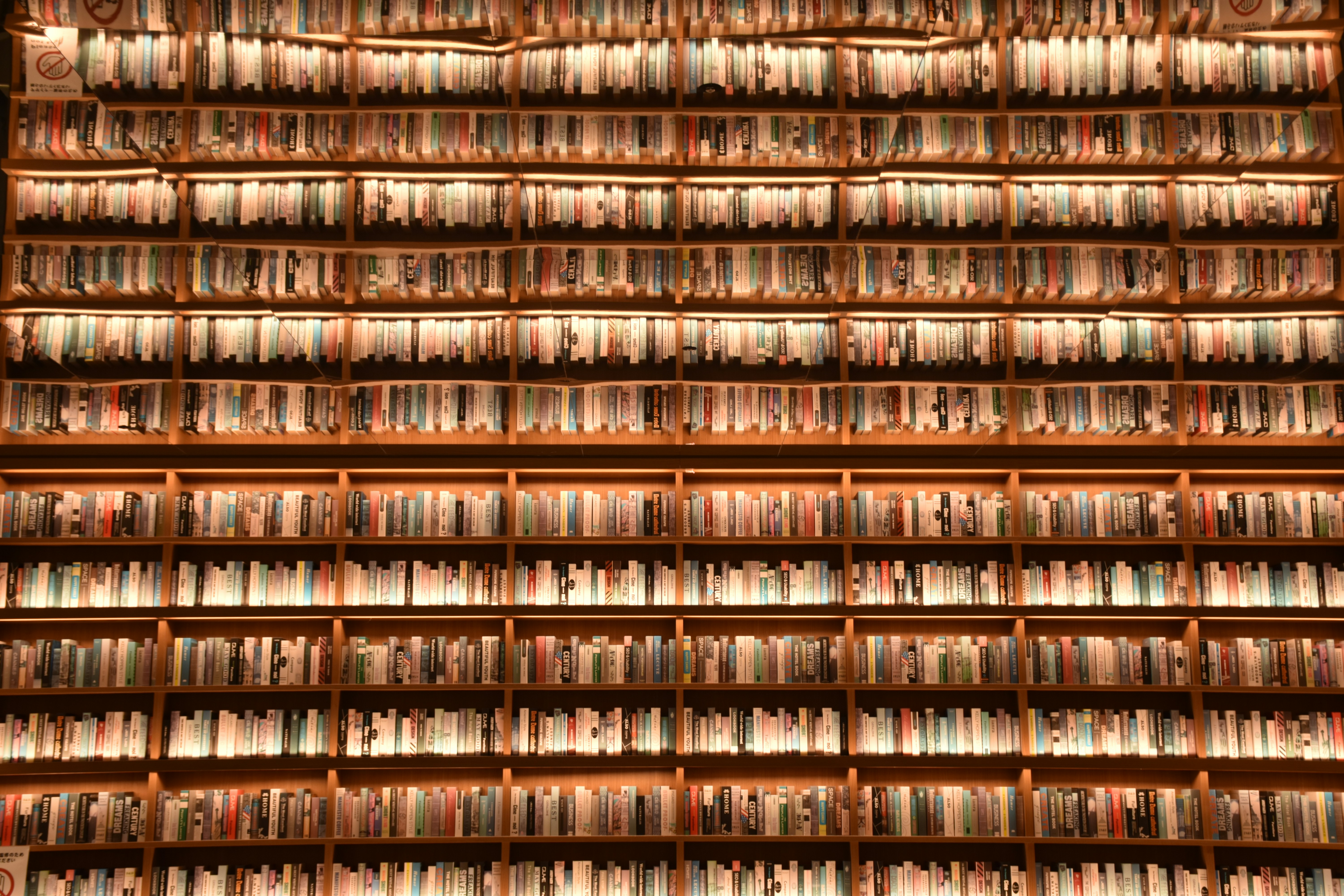Rows of books on shelves in a library