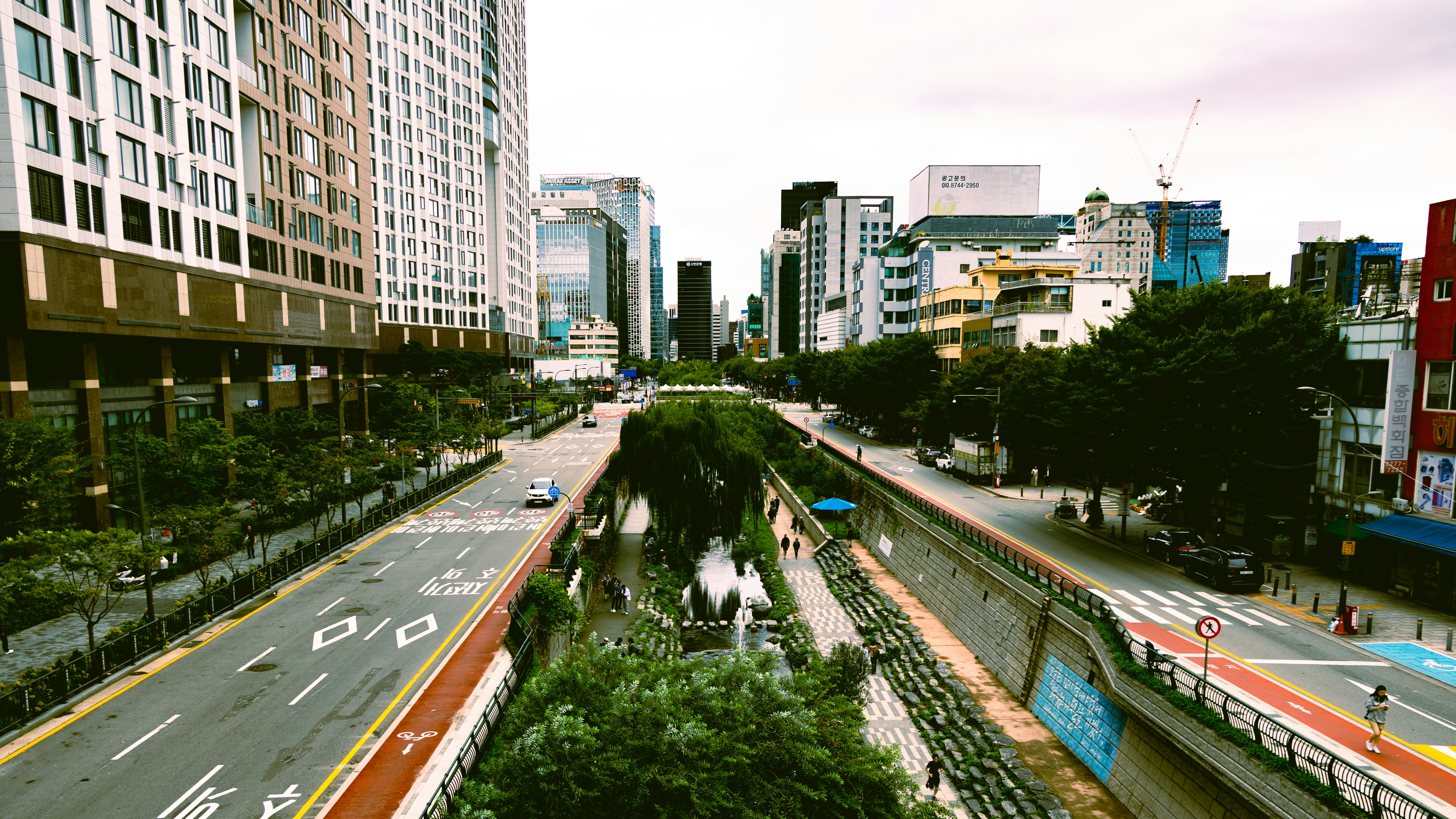 Modern city street with buildings and trees