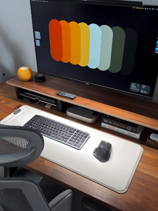 Modern desk setup with computer and accessories