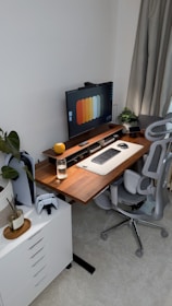 A modern desk setup with computer and gaming accessories.