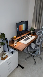 A modern desk setup with computer and gaming accessories.