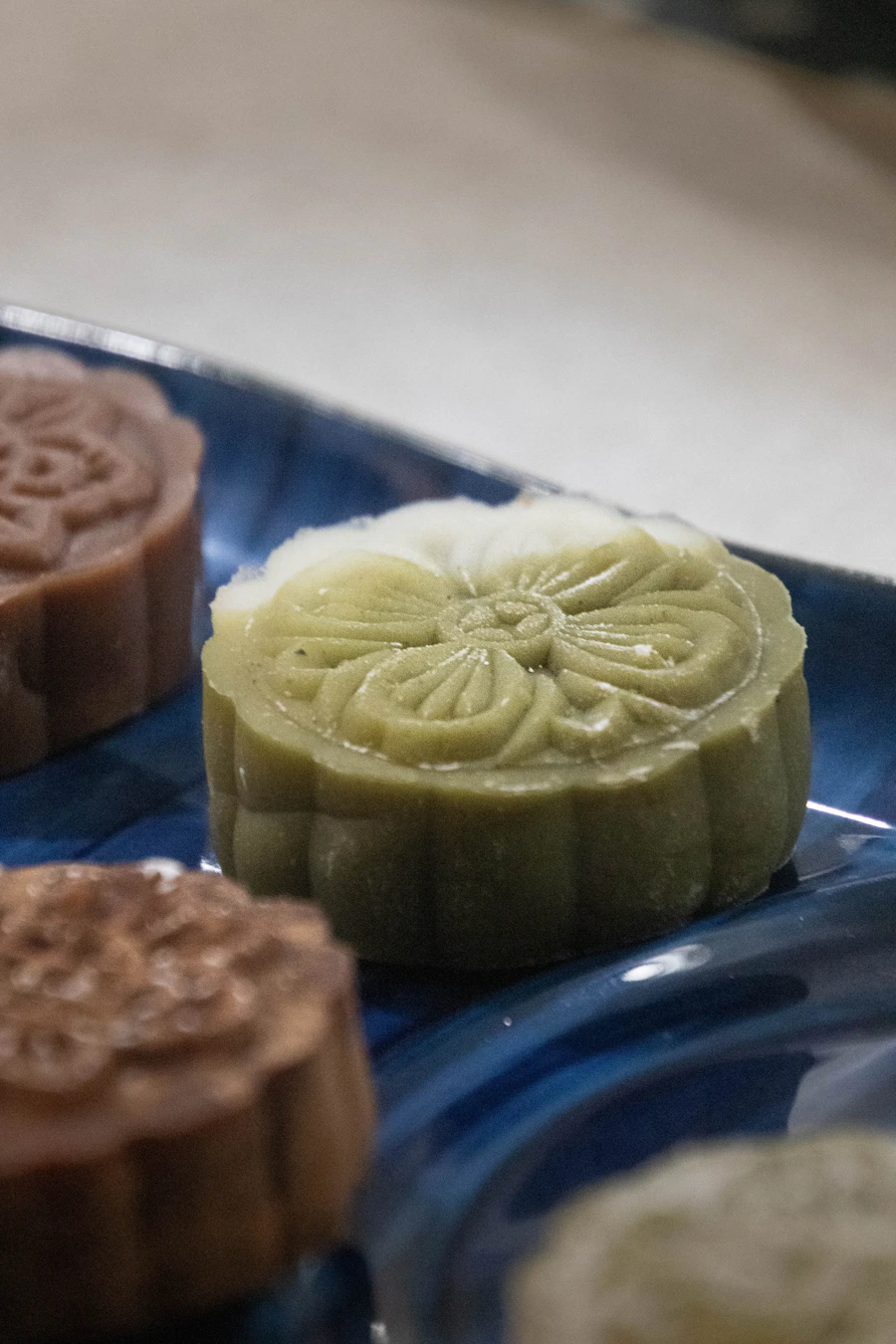 A close-up of round Chinese-style pastries