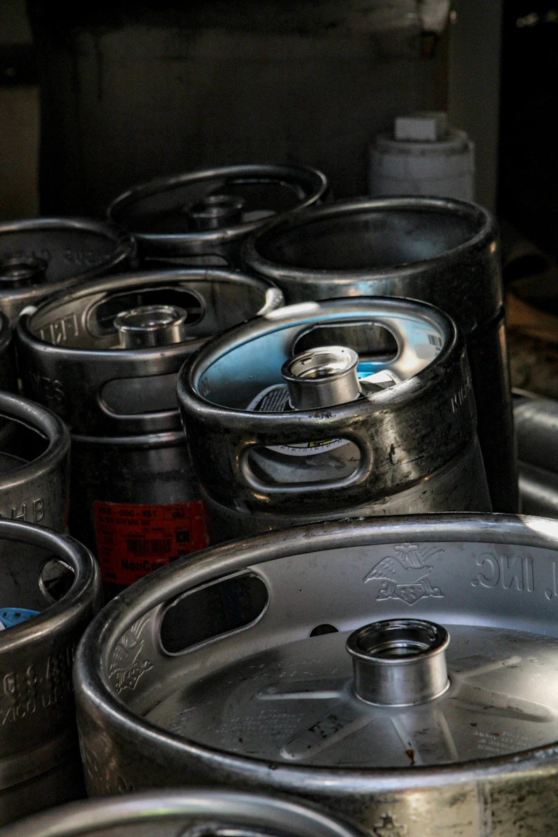 Stainless steel kegs waiting for inspection