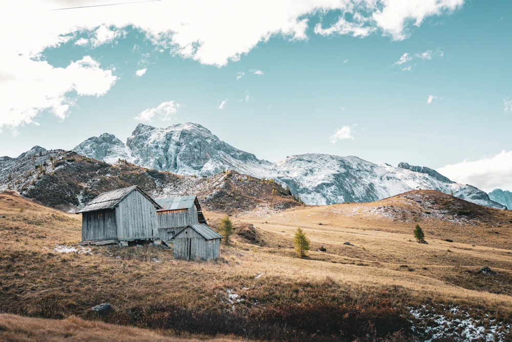 Rustic wooden cabins on mountainside