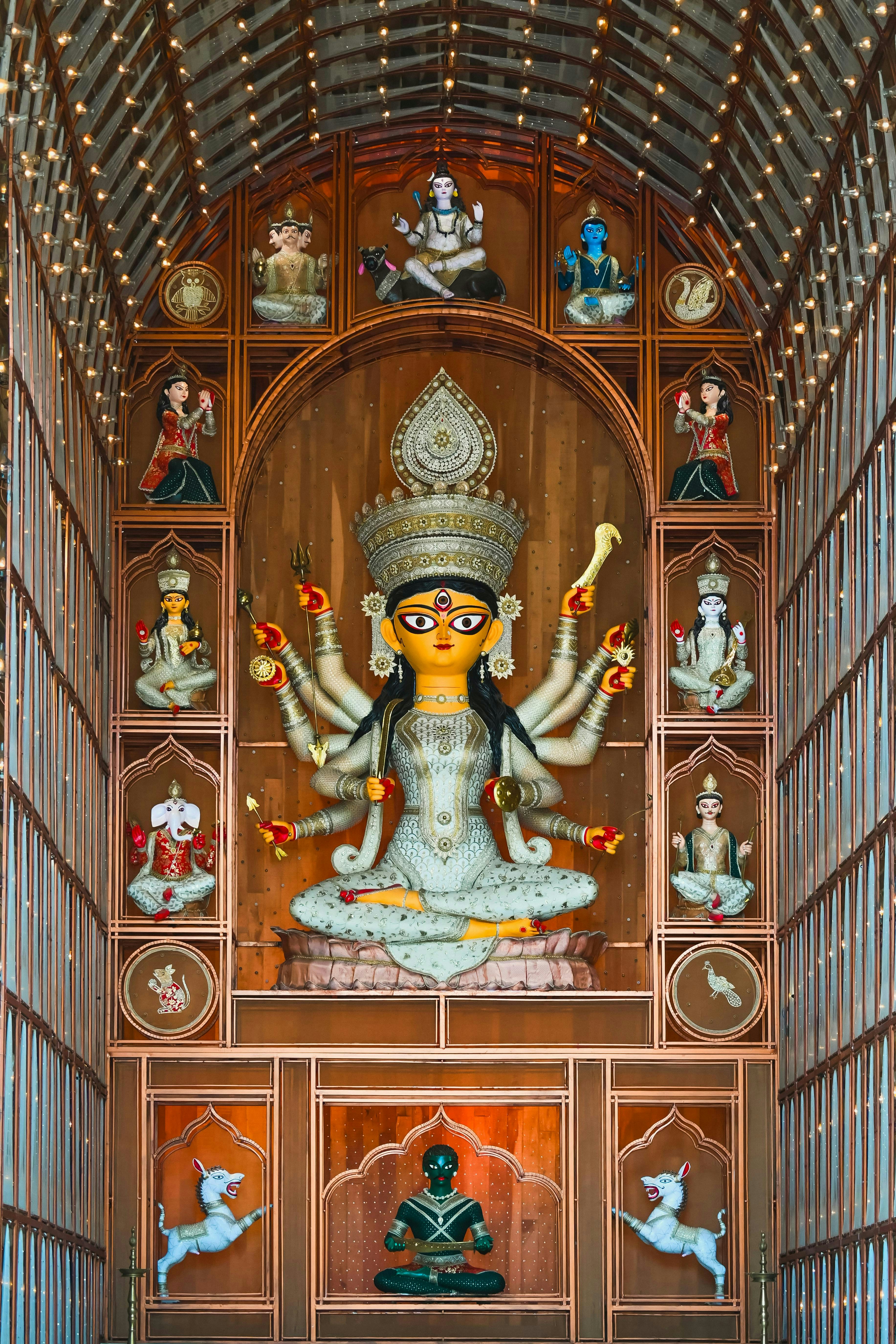 A statue of a multi-armed hindu goddess durga