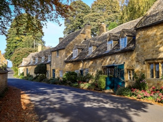 Row of quaint stone cottages with dormer windows
