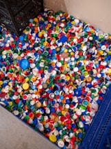 A large pile of colorful plastic bottle caps.