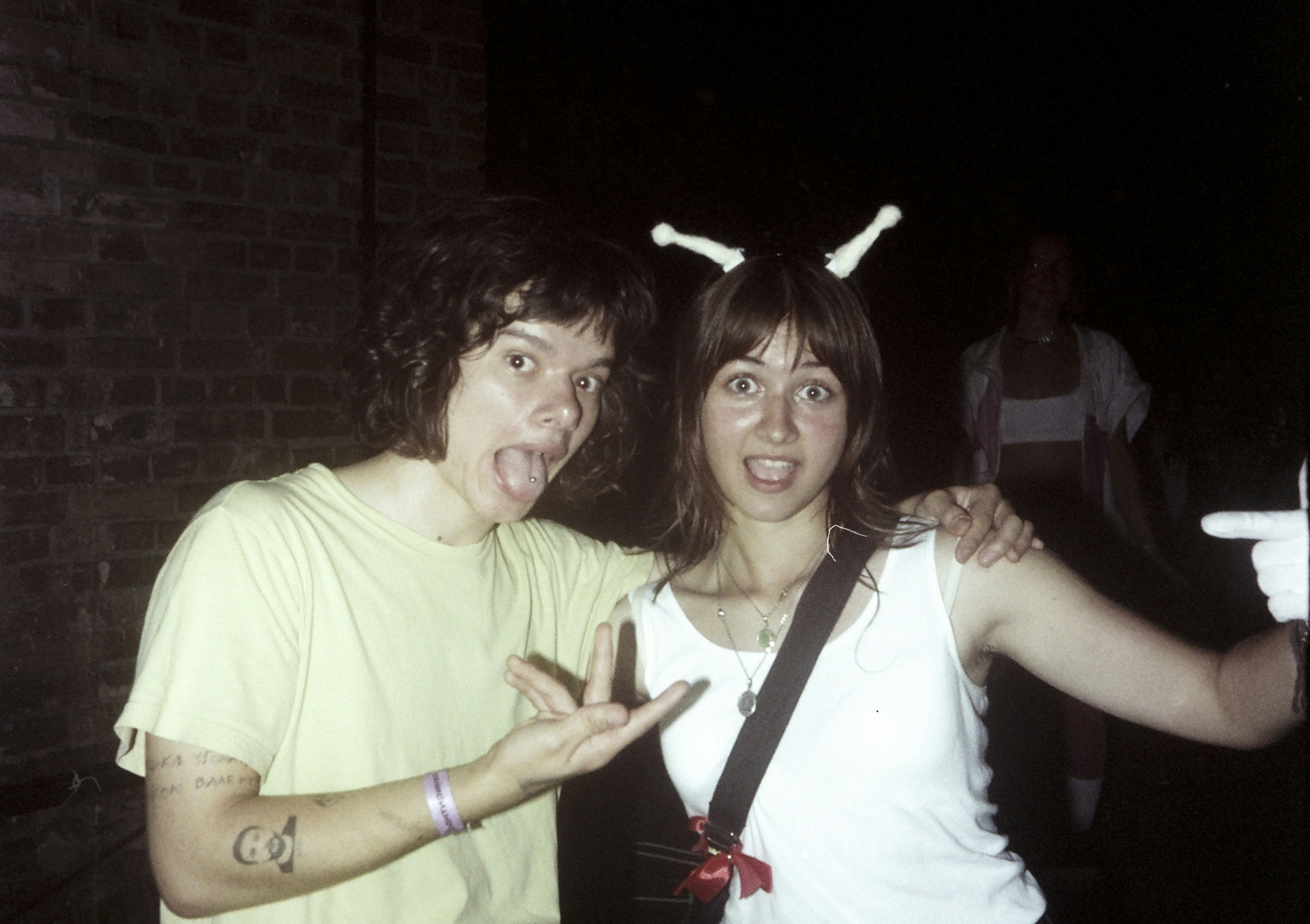 Two friends making faces at the camera