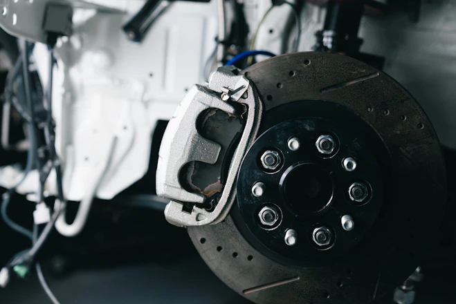 Close-up of a car's brake rotor and caliper