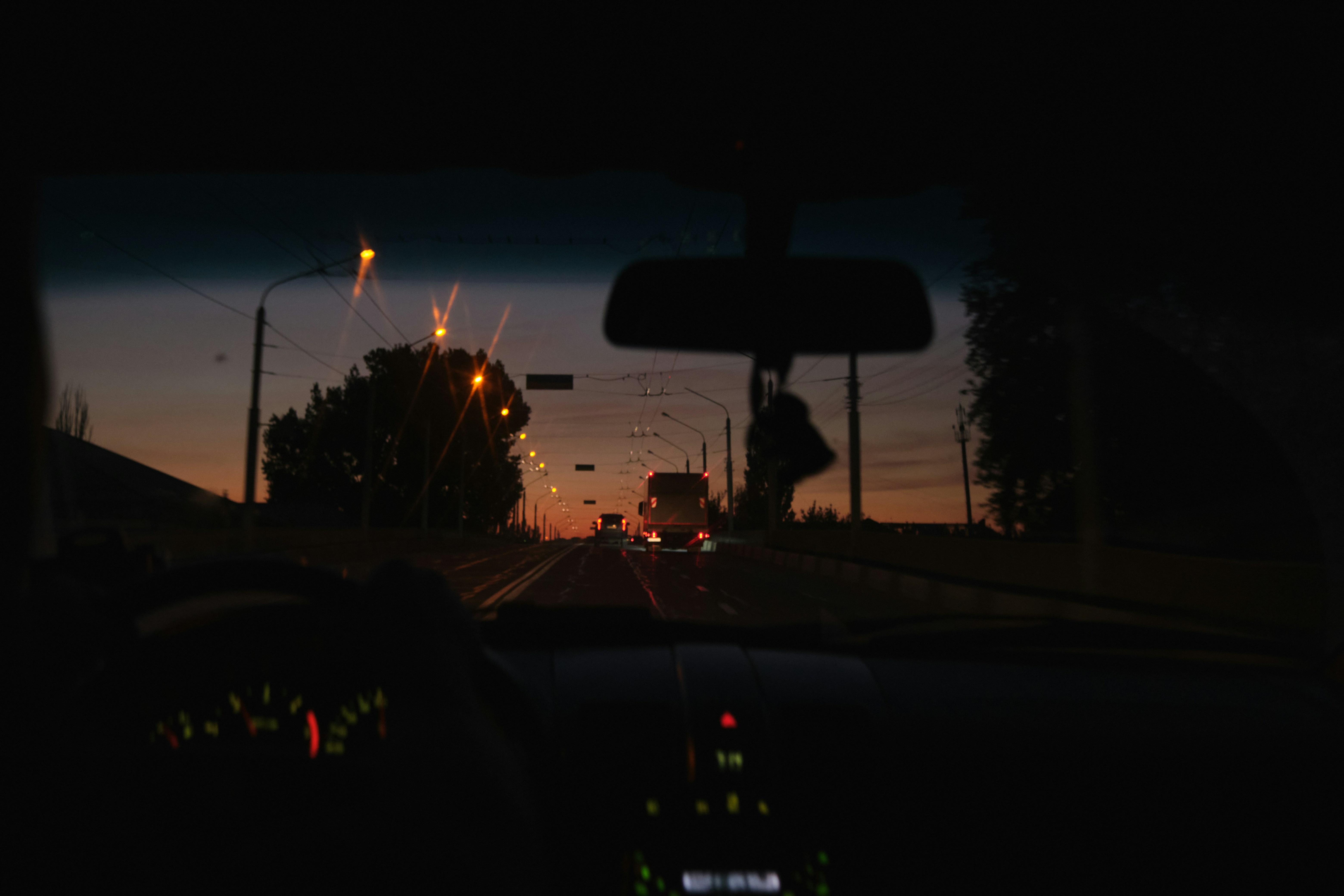 Driving on a road at sunset