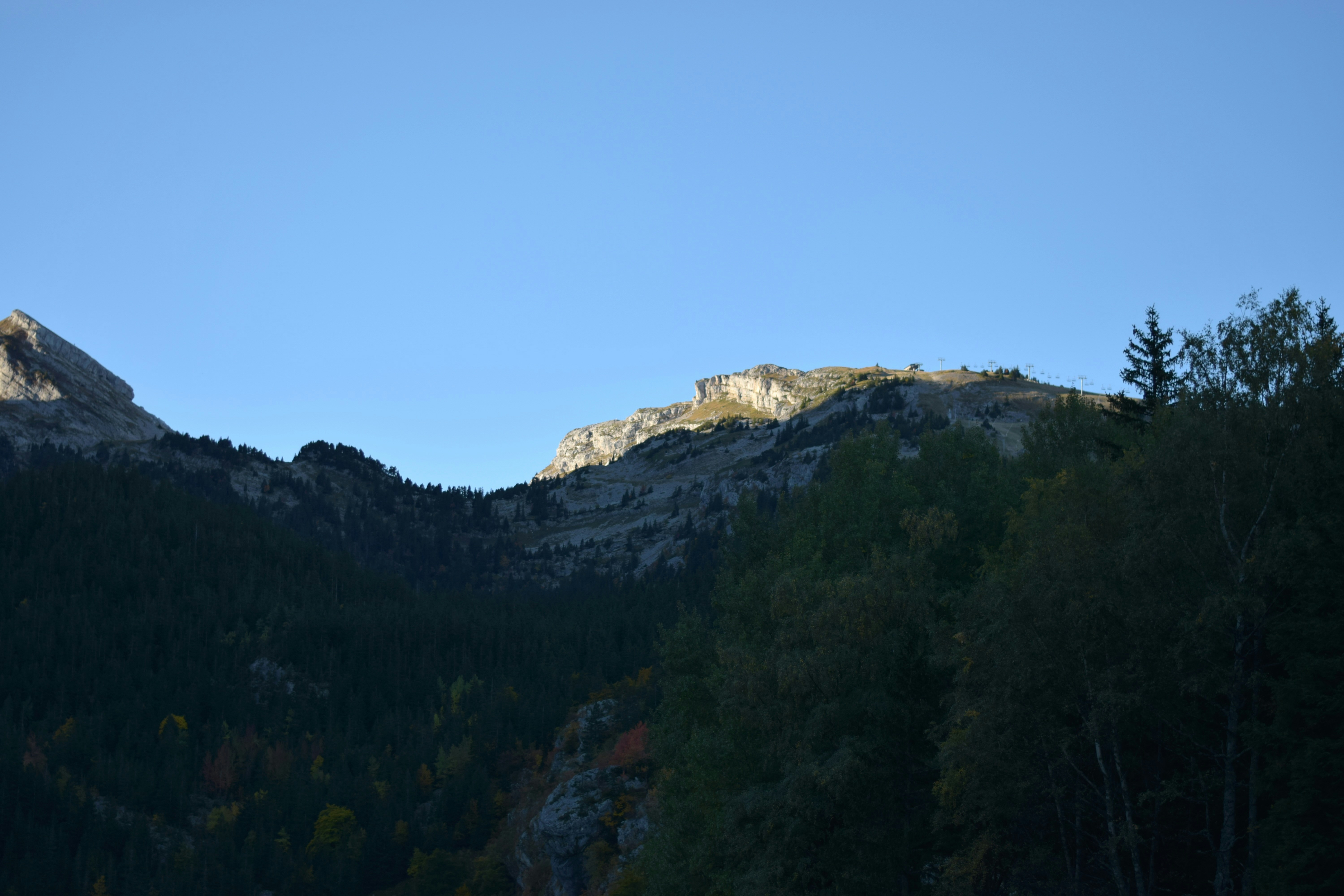 Luxury mountain tent night, premium camping gear forest, scenic hiking backpack vista, titanium camping stove flame., ilustrasi artikel Elevate Your Outdoor Experience: High-End Camping Gear Worth the Investment 5