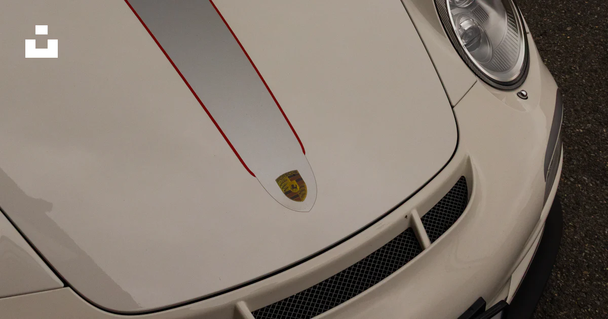 German Racing Silver Color Code White porsche sports car with silver racing stripes. photo – Free ...