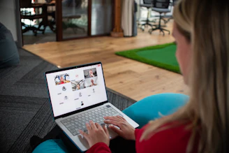 Woman on laptop in video conference call