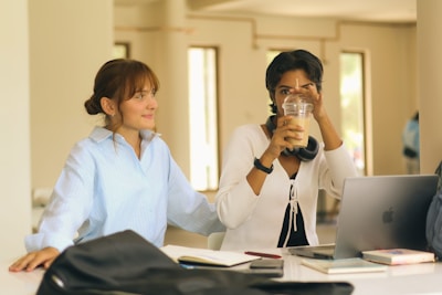 Two women studying together at a table.