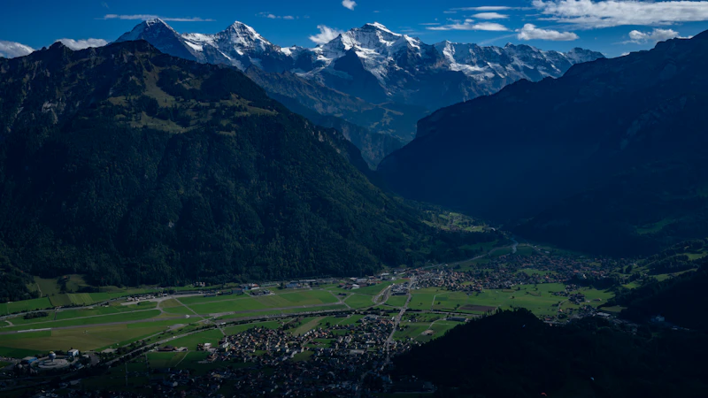 The Gotthard descent threads the Leventina and Ticino past Airolo and Bellinzona, the more theatrical of the two Alpine crossings.