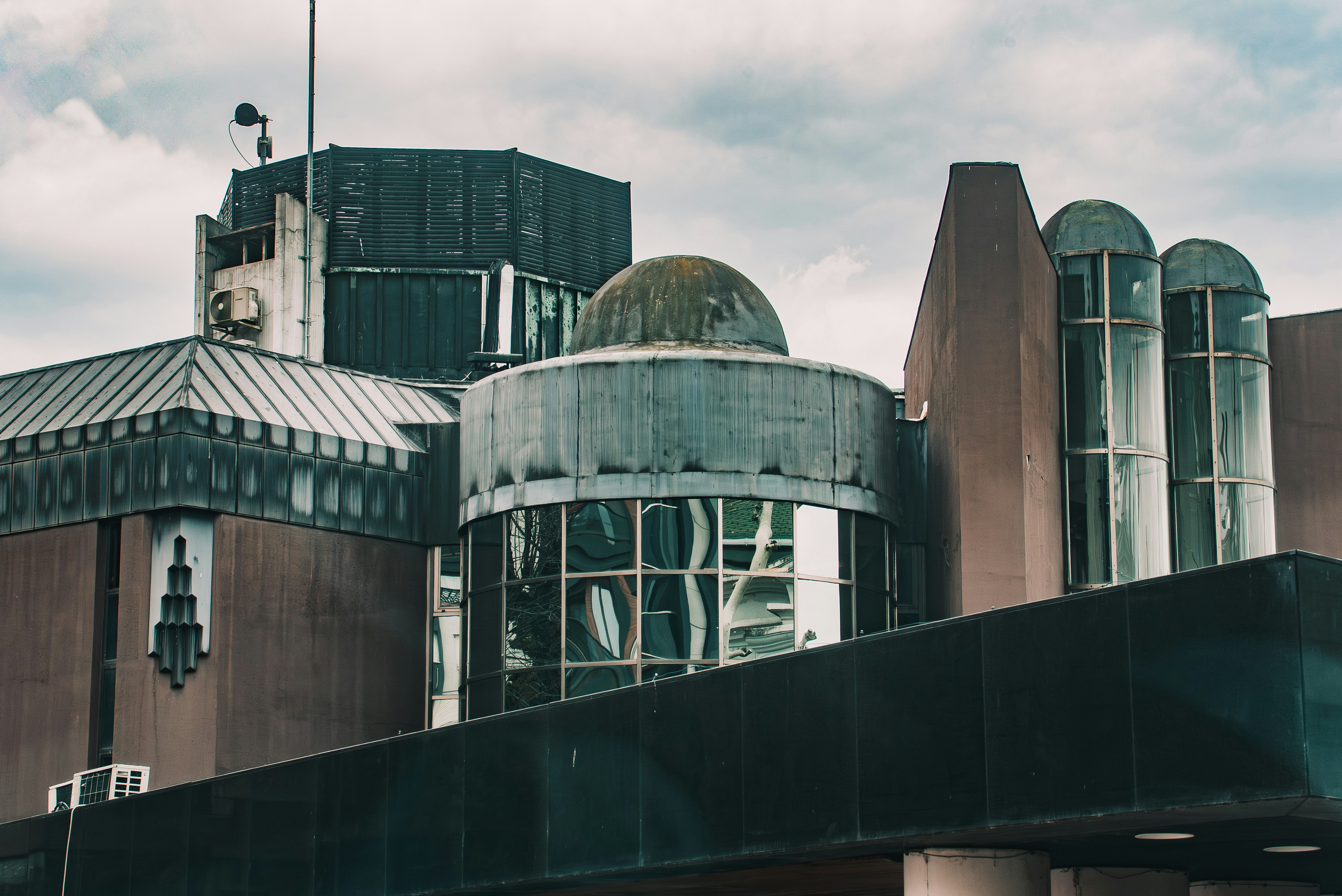 Modern brutalist building with unique architectural features.