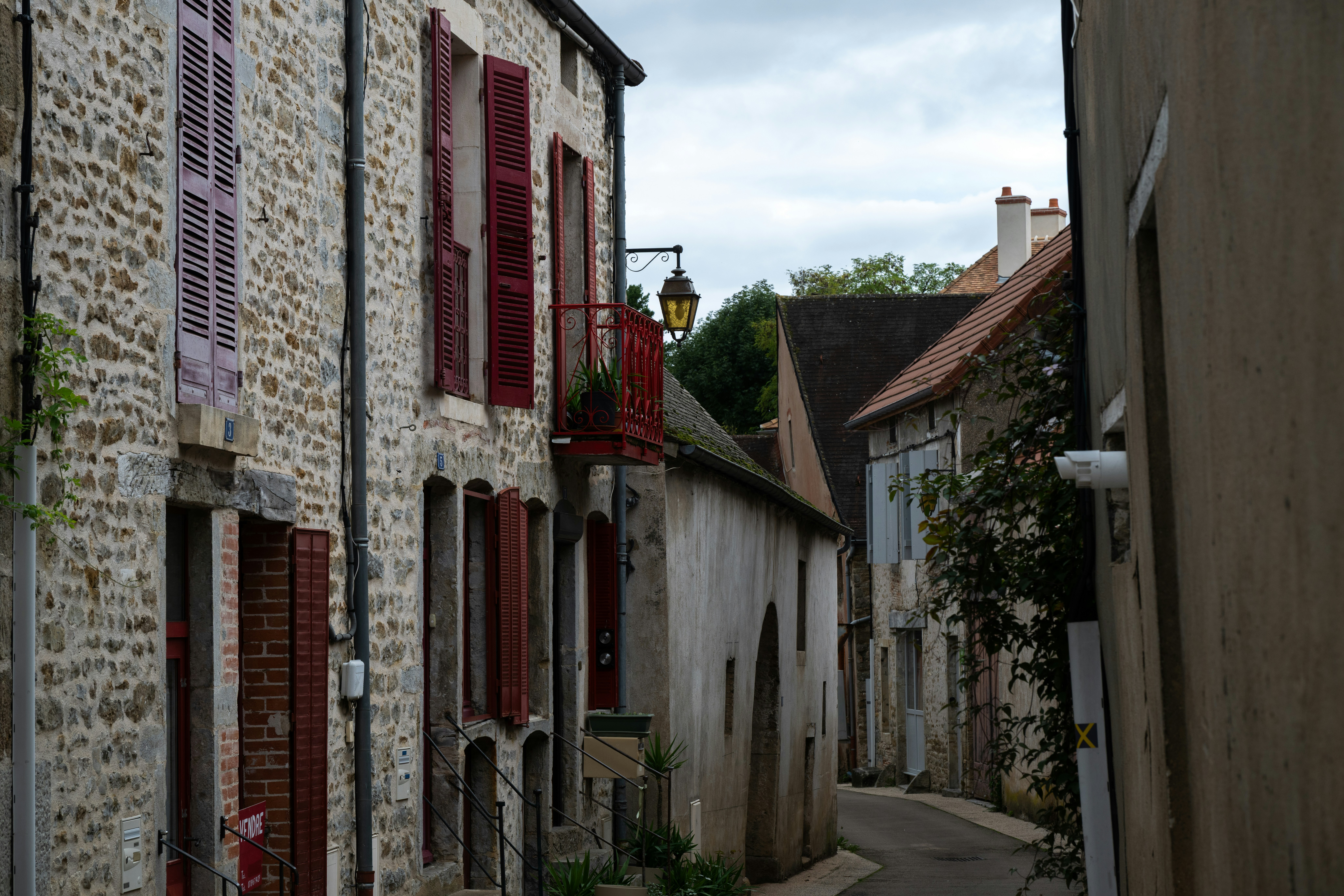 Narrow cobblestone street in a historic european town.