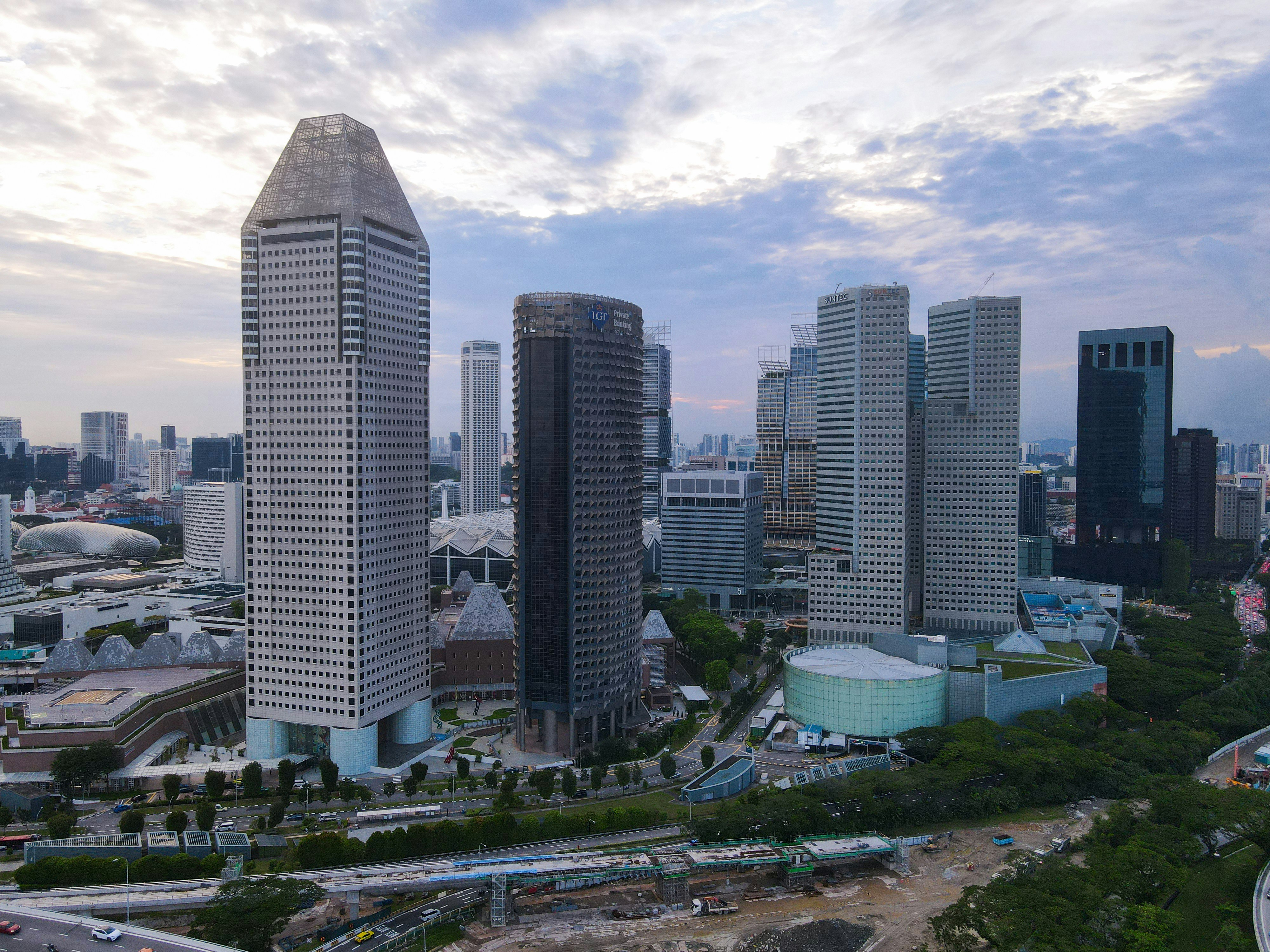 Modern skyscrapers in a city skyline at dusk