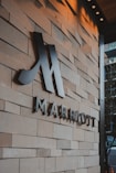 Marriott hotel logo on a textured wall