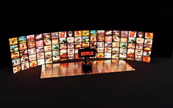 Netflix logo displayed on screen with many movie posters.