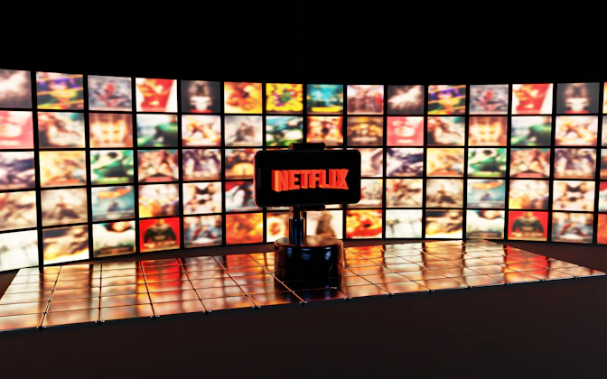 Netflix logo displayed on a wall of movie posters
