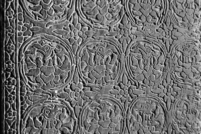Intricate stone bas-relief carvings in Angkor Wat's third gallery (via Unsplash)