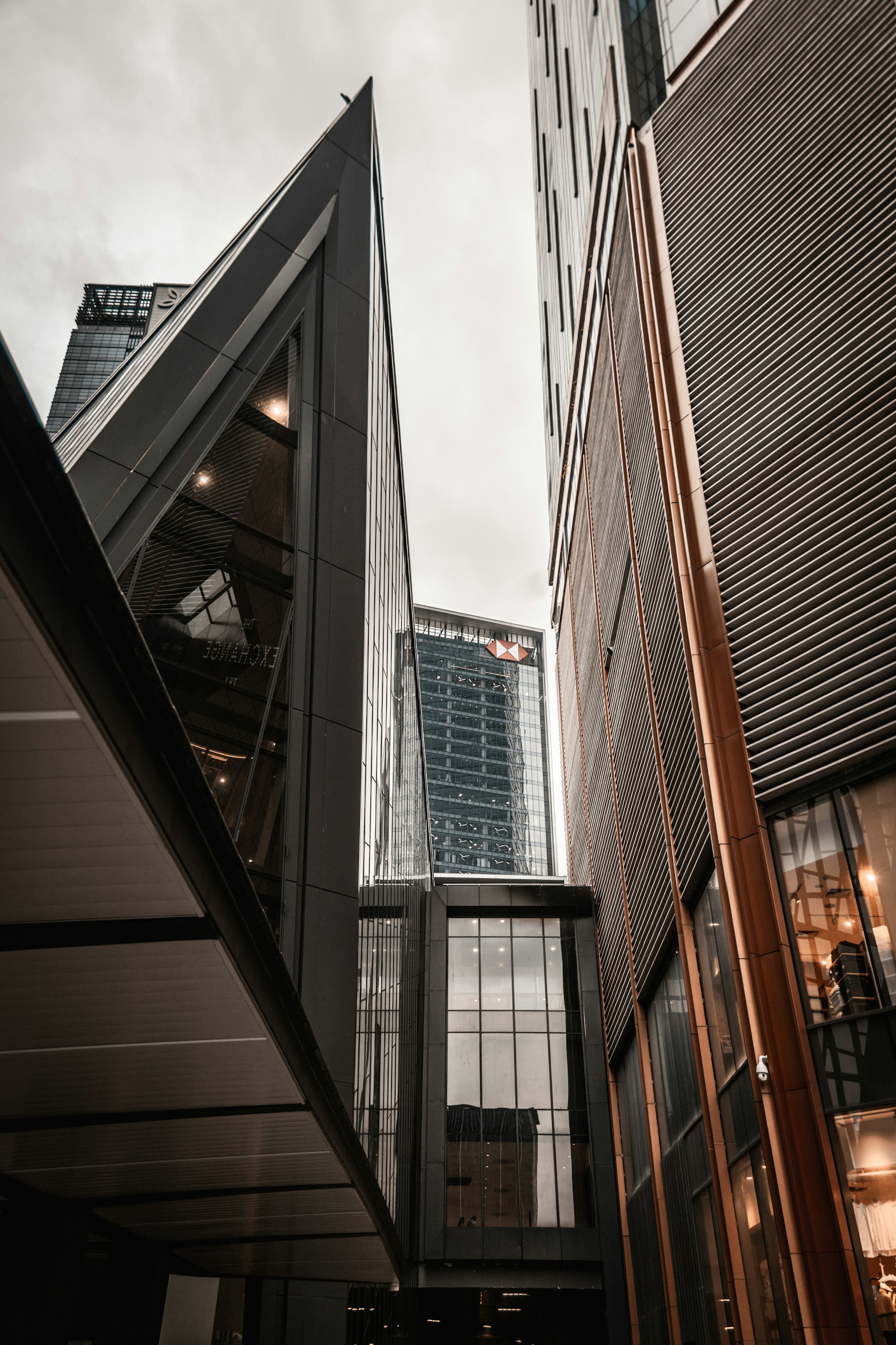 Modern architectural buildings against a cloudy sky