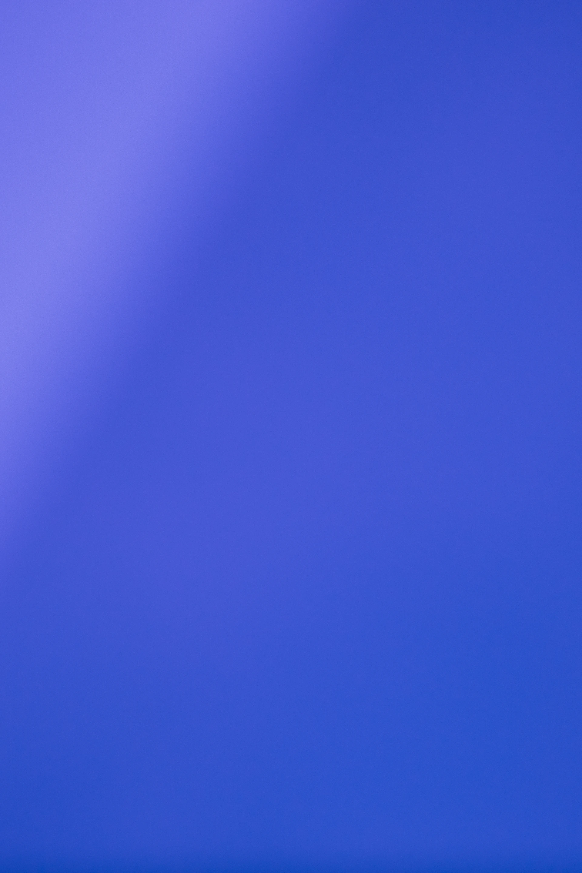 Solid blue background with subtle light gradient