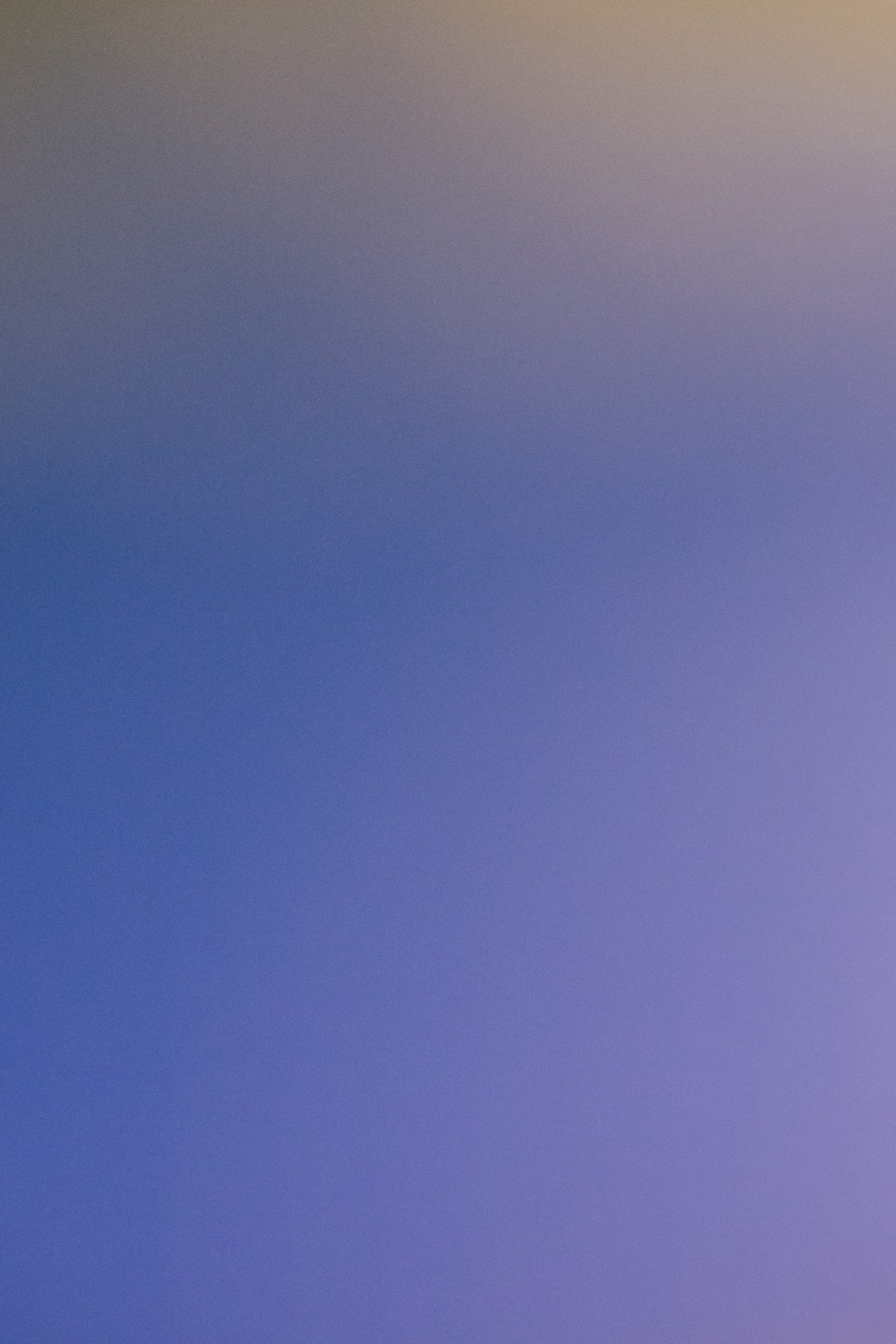 Gradient of blue to light yellow sky